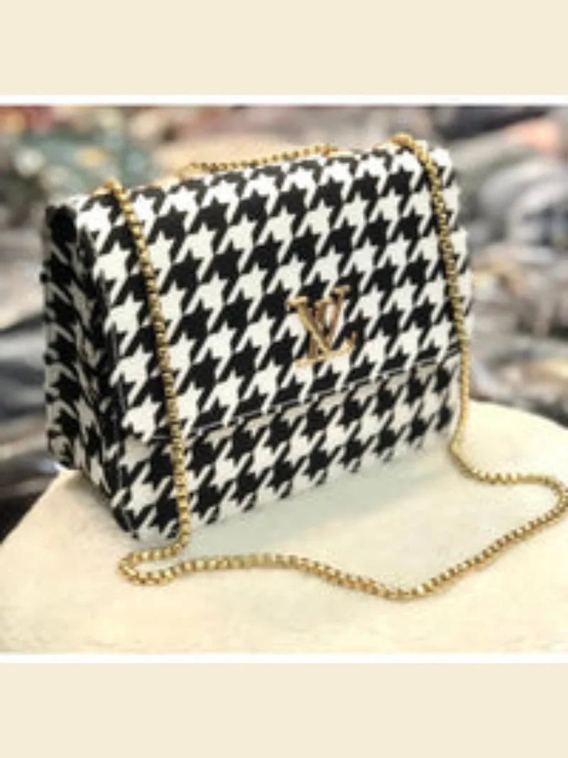 Timeless Elegance: Black & White Checkered Handbag