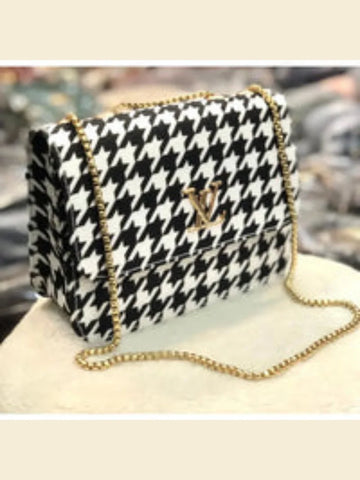 Timeless Elegance: Black & White Checkered Handbag